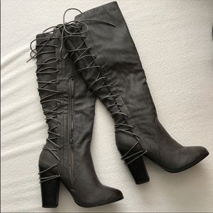 Laced back knee high boots